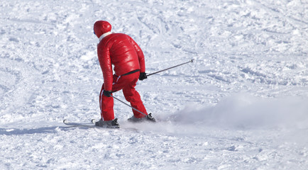 people skiing in the snow in the winter