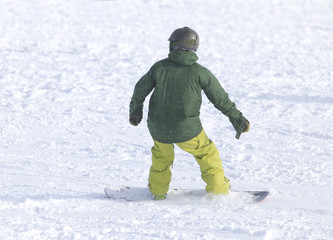 Fototapeta na wymiar people snowboarding on the snow