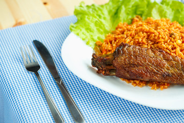 Delicious dish of turkey meat with rice and lettuce