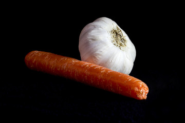 Carrot and Garlic on Black