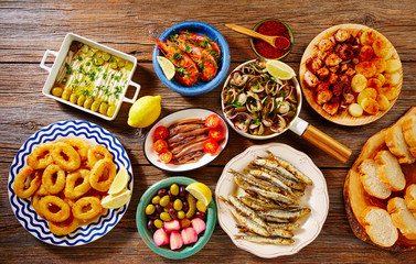 Tapas seafood clams shrimps calamari anchovies