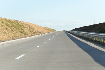 Fototapeta premium new asphalt road on nature