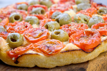 Focaccia with cherry tomatoes and green olives