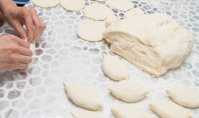 cooking cakes of the dough in the kitchen