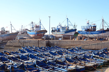 Essaouira, Morocco -  January 6, 2016: blue boats in the harbour of essaouira
