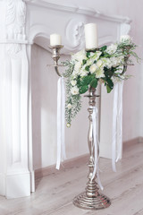 Romantic wedding flower bouquet with candlestick