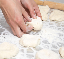 cooking cakes of the dough in the kitchen