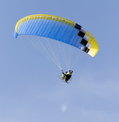 parachute flying in the sky