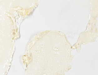 Glue on a white wall. macro