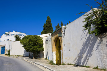 Tunisia. Sidi Bou Said - typical building with white walls, blue doors and windows