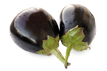 Two fresh heirloom eggplants isolated