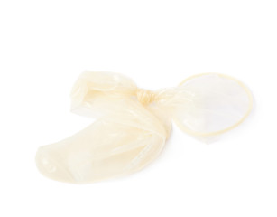 Fototapeta na wymiar Used lated condom isolated