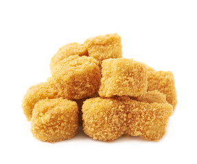 Pile of breaded crab balls isolated