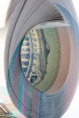 Russian national currency. stack of new paper money rolled into a roll close-up. shallow depth of...