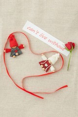 Valentine, greeting card with red little rose and red ribbon