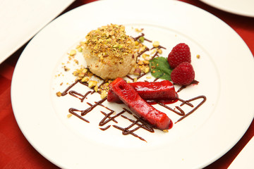 curd dessert with berries on a plate