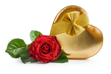 Golden gift box and red rose