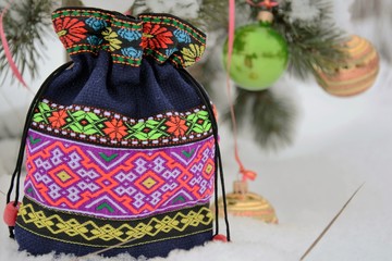 with gifts on snow Embroidered Bag