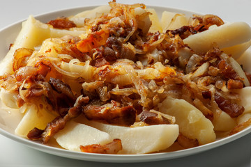 Fried potatoes with onion and bacon