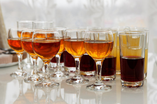 Glasses with different drinks on the cocktail party