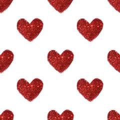 Fototapeta premium Background with hearts of red glitter, seamless pattern