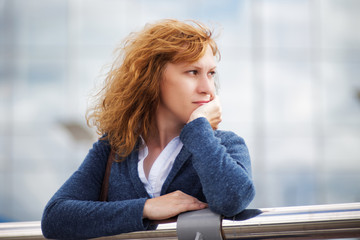 Portrait of a young woman looking thoughtfully into the distance