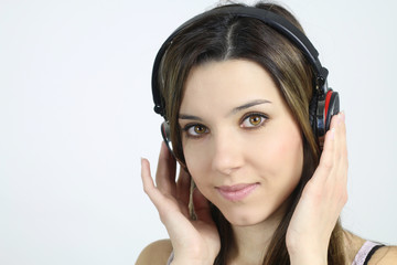 Fototapeta premium beautiful woman listening to music with a headphones