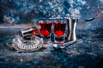 Alcoholic beverage, strong cocktails with cherry and red vodka