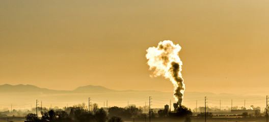 toxic smoke in a foggy valley