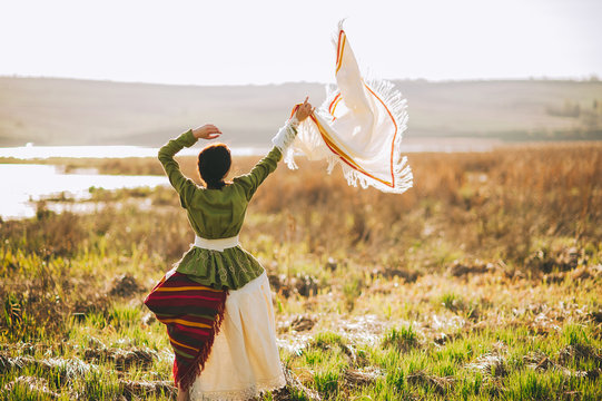 Beautiful bohemian girl in spring garden