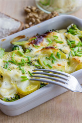 potato casserole / Potato casserole with cheese and chives