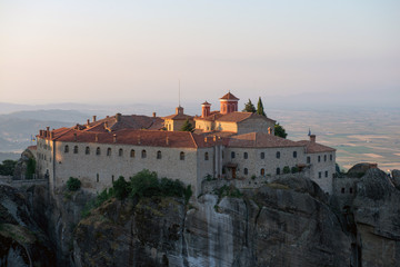 The Holy Monastery of St. Stephen in Meteora - complex of Eastern Orthodox monasteries at sunrise, Greece