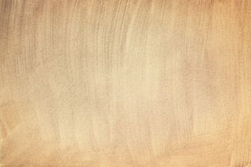 Top view photograph of sandy beach. Horizontal photo taken from above with visible sand texture. Vintage, retro effect processing.