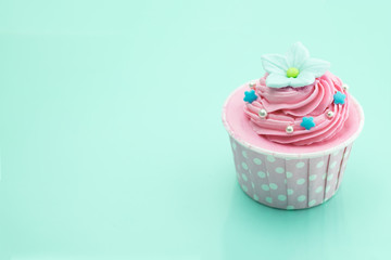 Cup cake on colorful background