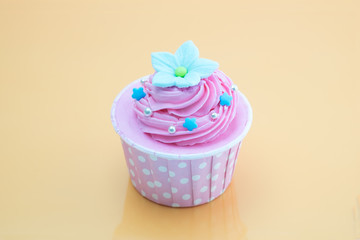 Cup cake on colorful background