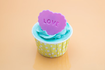 Cup cake on colorful background
