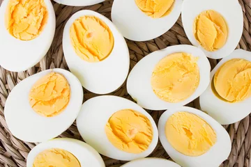 Foto op Canvas sliced hard boiled eggs © czarny_bez