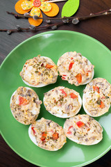 stuffed eggs with peppers, mushrooms and herbs - selective focus