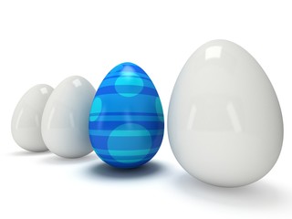Blue easter egg in a row of the white eggs