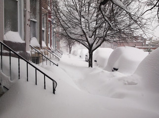Snow Covered Sidewalk and Cars