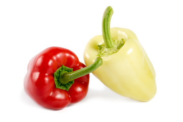Red and yellow sweet peppers isolated on white background