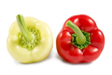 Red and yellow sweet peppers isolated on white background