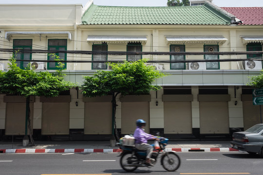old row house near street town in Bangkok
