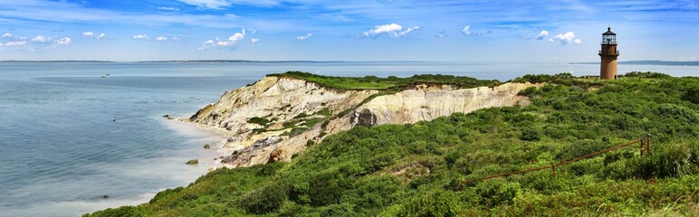 Panorama of a Gay Head lighthouse on a cliff in Aquinnah, Marthas Vineyard