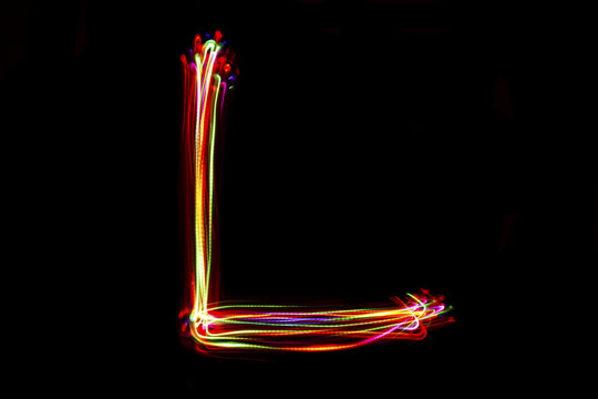 Word writing from light on the black background.