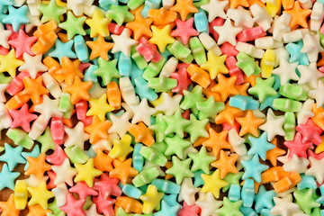 Fototapeta na wymiar Various candy stars background