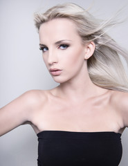 Fototapeta premium beautiful young woman with flawless skin and perfect make-up