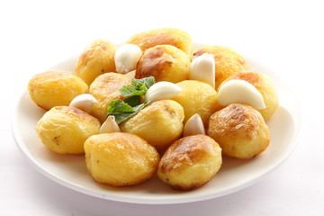 Homemade baked potatoes with garlic.Selective focus .