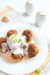 Meatballs with white creamy sauce