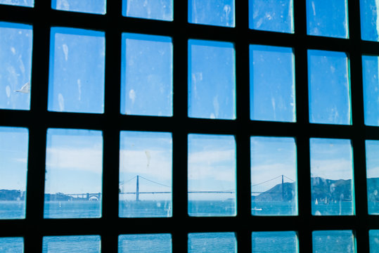Golden Gate Bridge from Alcatraz Behind a Barred Window